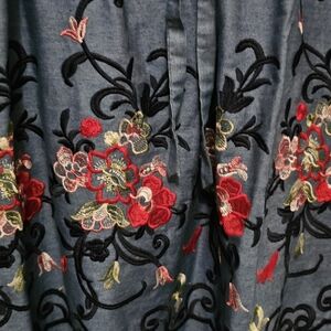 Beautiful cotton with hand made embroidery flower .